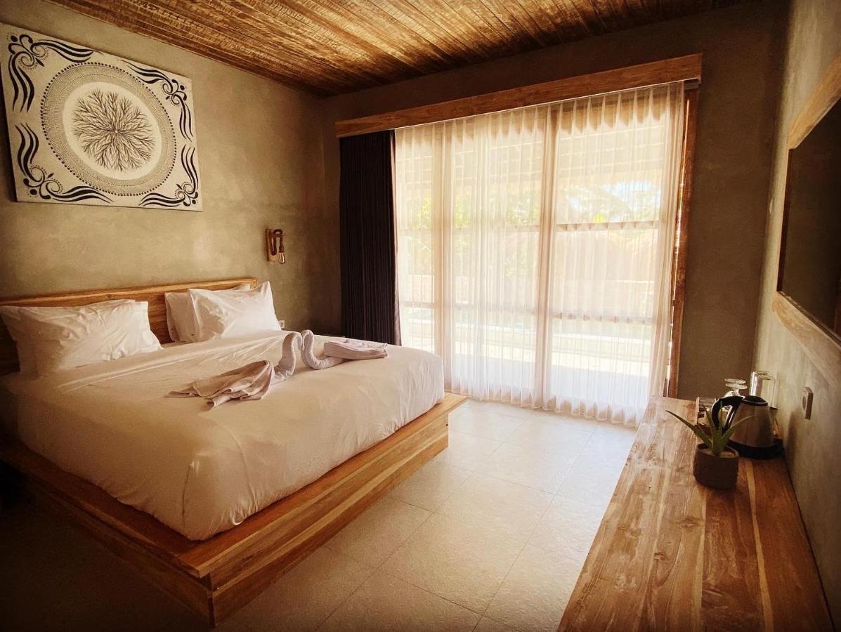 Golden Garuda Cottages Polilit Eksteriør bilde