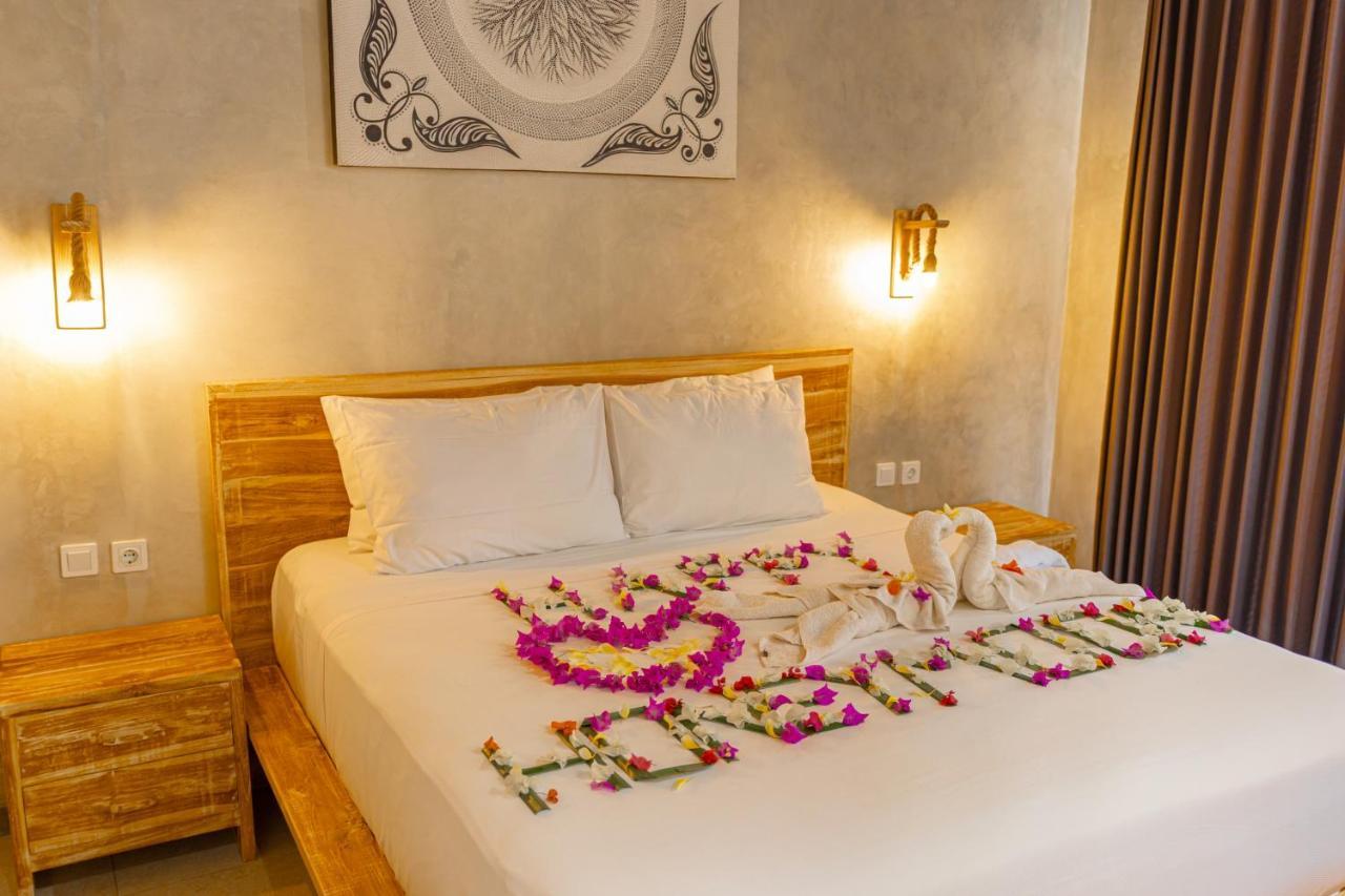 Golden Garuda Cottages Polilit Eksteriør bilde