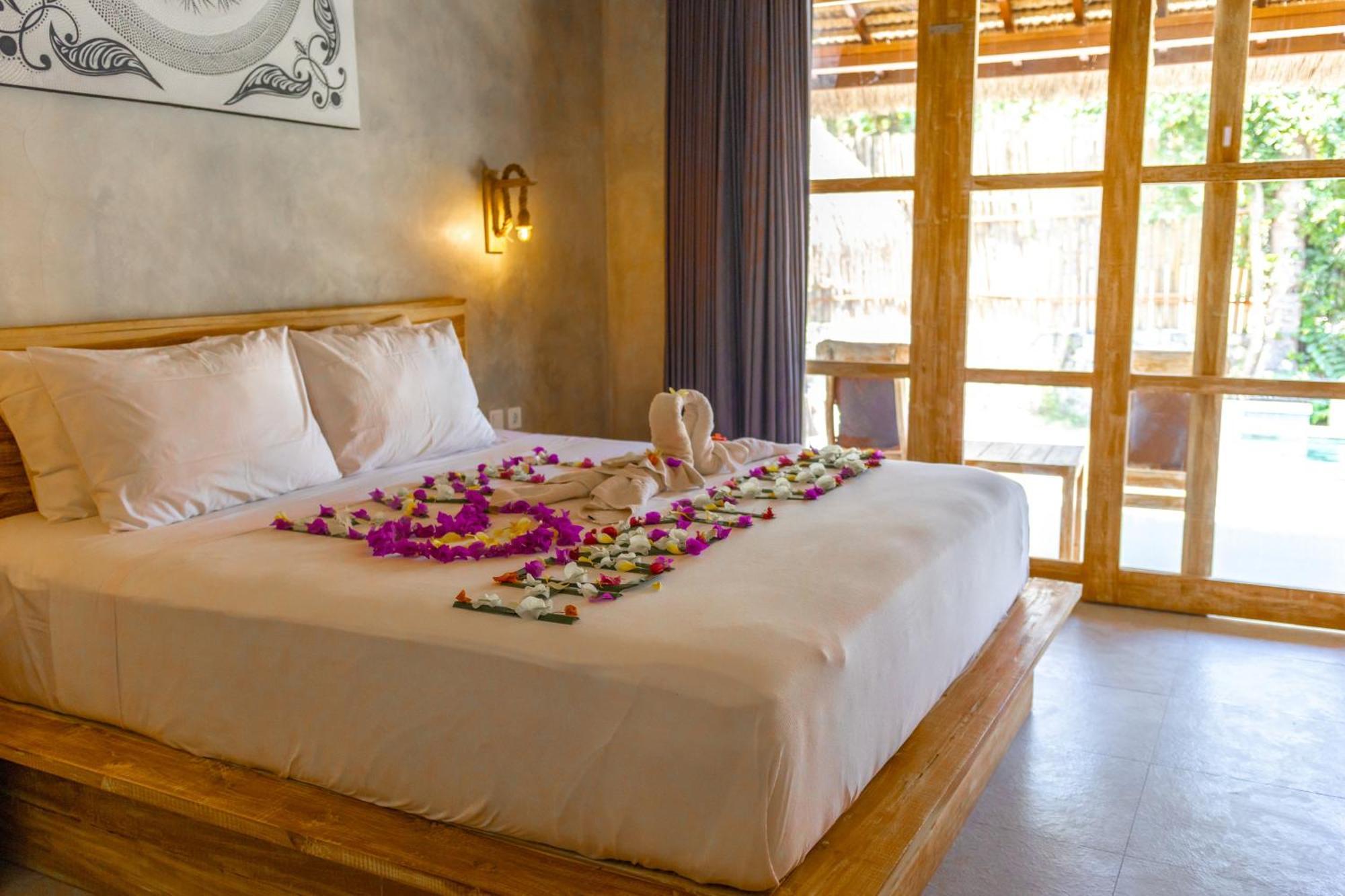 Golden Garuda Cottages Polilit Eksteriør bilde